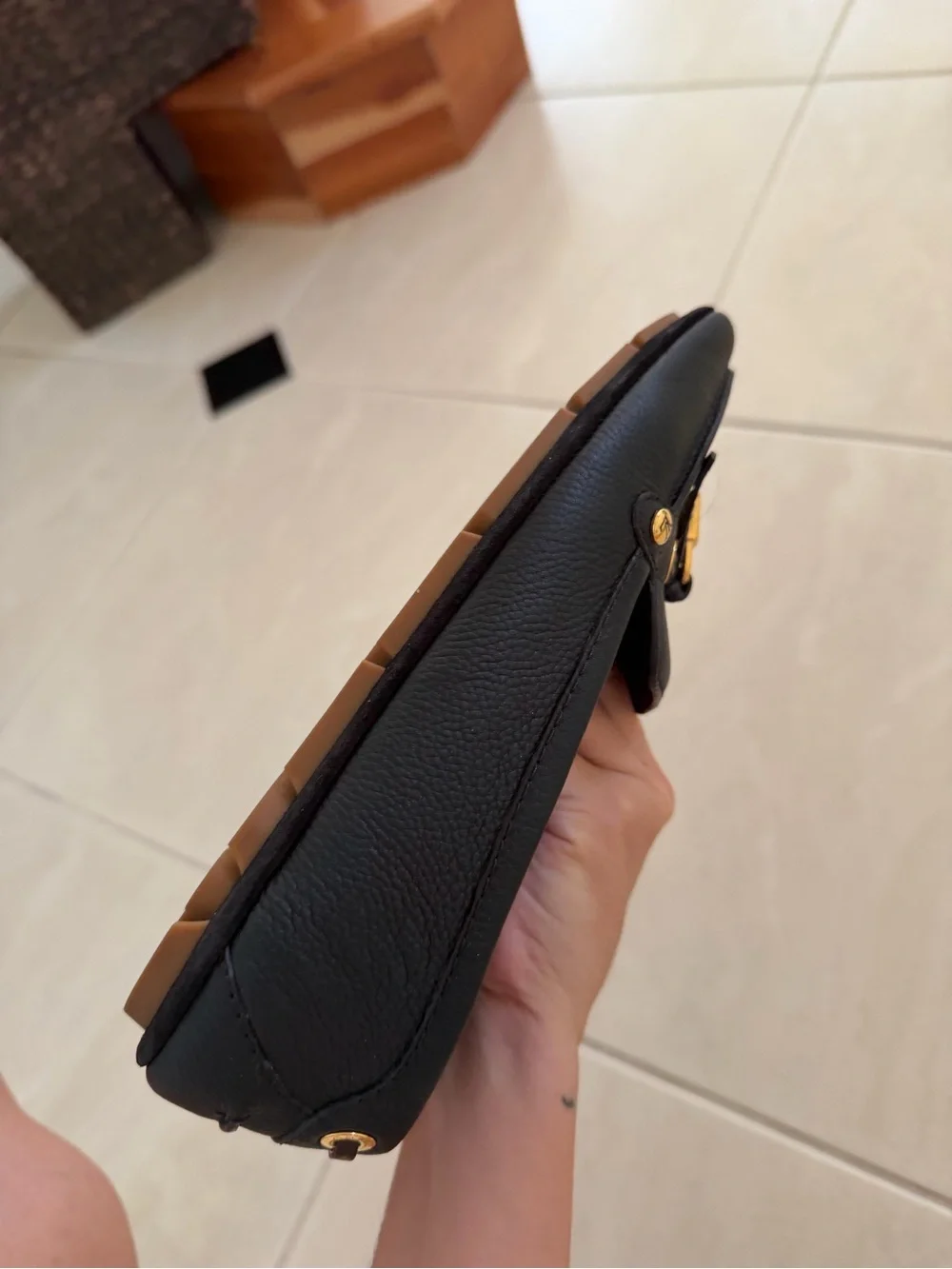 Louis Vuitton Black Leather Loafers with Gold Accent Hardware
